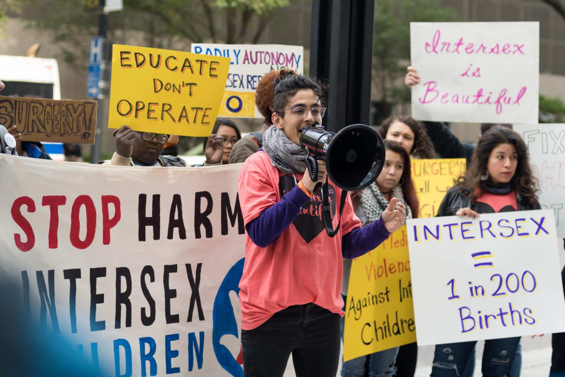 A person with a megaphone at a protest.