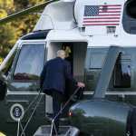 President Donald Trump boards Marine One as he leaves the White House to go to Walter Reed National Military Medical Center after he tested positive for COVID-19, Friday, Oct. 2, 2020, in Washington. (AP Photo/Alex Brandon)