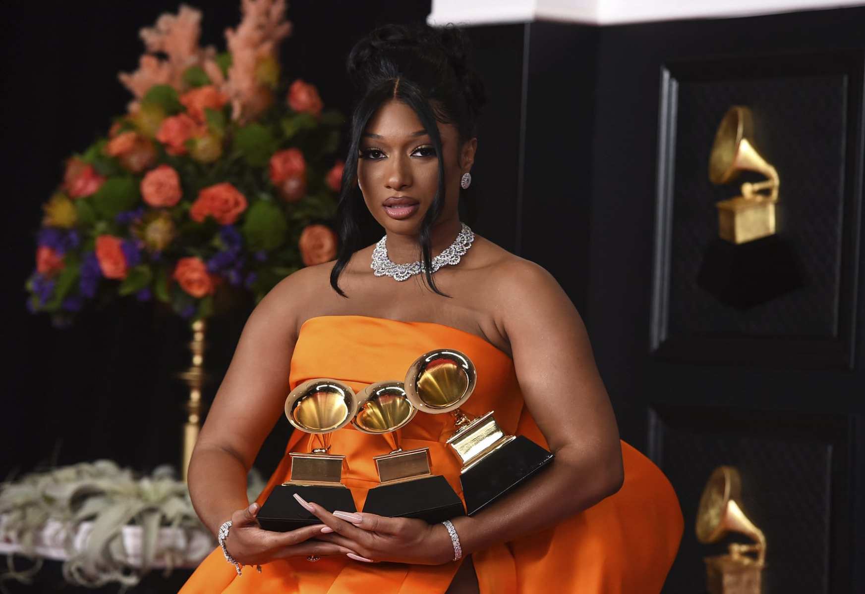 Megan Thee Stallion, winner of the awards for best rap song and best rap performance for "Savage Remix" and best new artist poses in the press room.