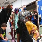 US Vice President Kamala Harris, Education Secretary Miguel Cardona (R), and US Representative Rosa DeLauro (C) visit a classroom in the West Haven Child Development Center in West Haven, Connecticut.