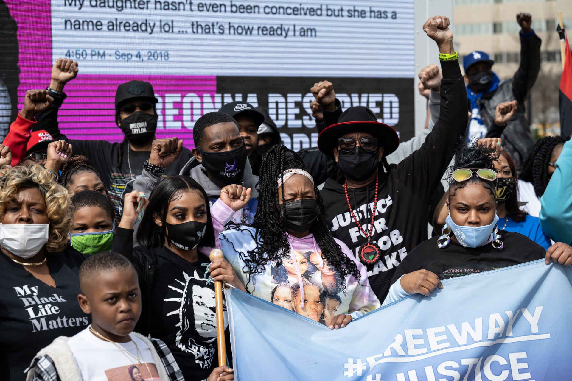 Tamika Palmer and others at a protest