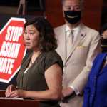 Rep. Grace Meng (L) (D-NY) joined by Rep. Mark Takano (C) (D-CA) and Rep. Judy Chu (D-CA) speaks on the COVID-19 Hate Crimes Act at the U.S. Capitol.