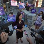 Michelle Wu speaks to the media