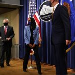 U.S. Attorney General Merrick Garland arrives at a news conference to announce a civil enforcement action at the Department of Justice.