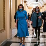 Nancy Pelosi leaves the chamber on Capitol Hill.