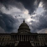 Storm clouds hang above the U.S. Capitol Building.