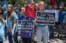 Pro-life protesters stand near the gate of the Texas state capitol.