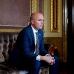 Utah Gov. Spencer Cox looks on at the Utah State Capitol.