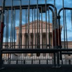 Fences surround the Supreme Court building.