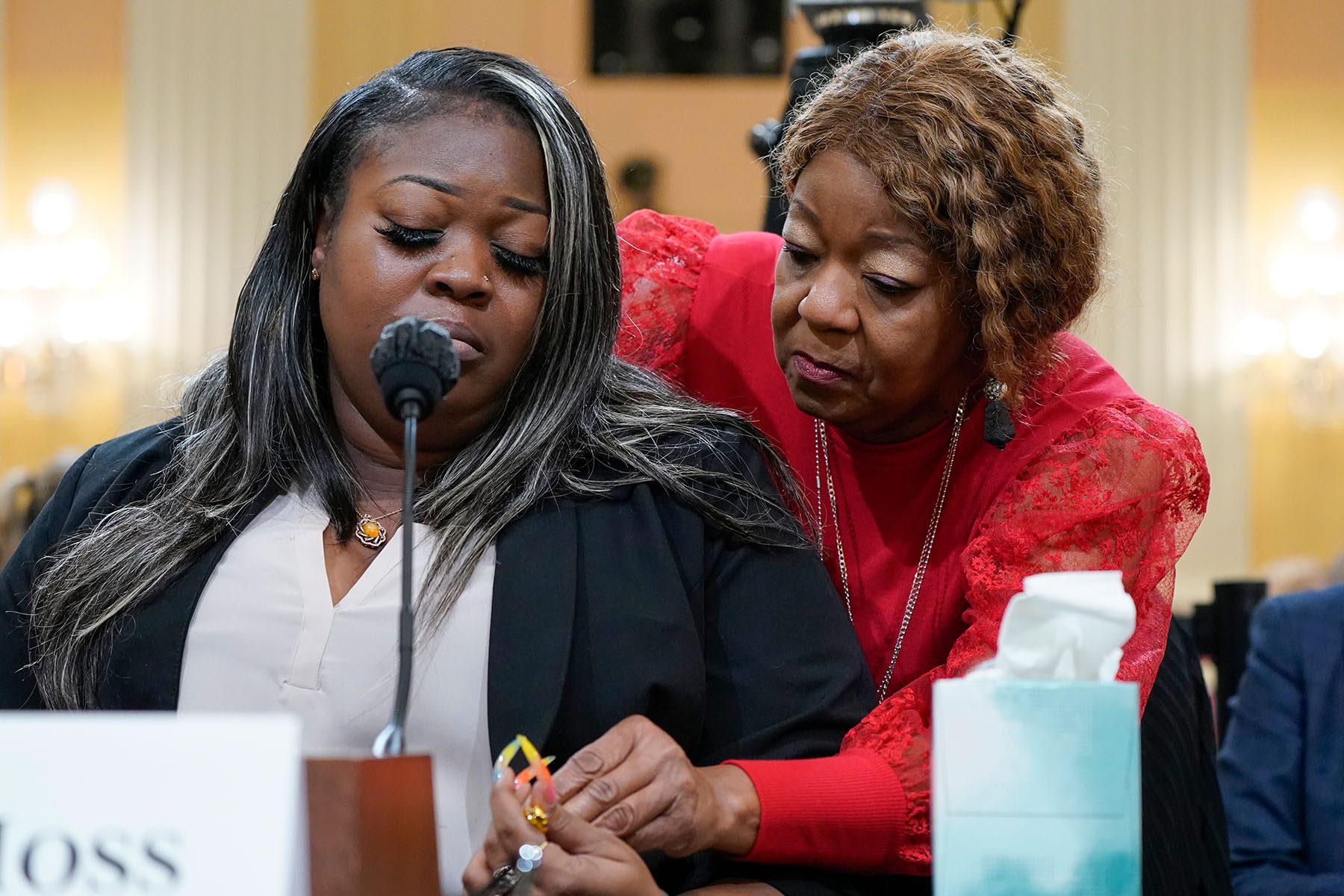Wandrea "Shaye" Moss is comforted by her mother Ruby Freeman as she testifies.