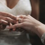 Cropped shot of two unrecognisable women exchanging rings on their wedding day