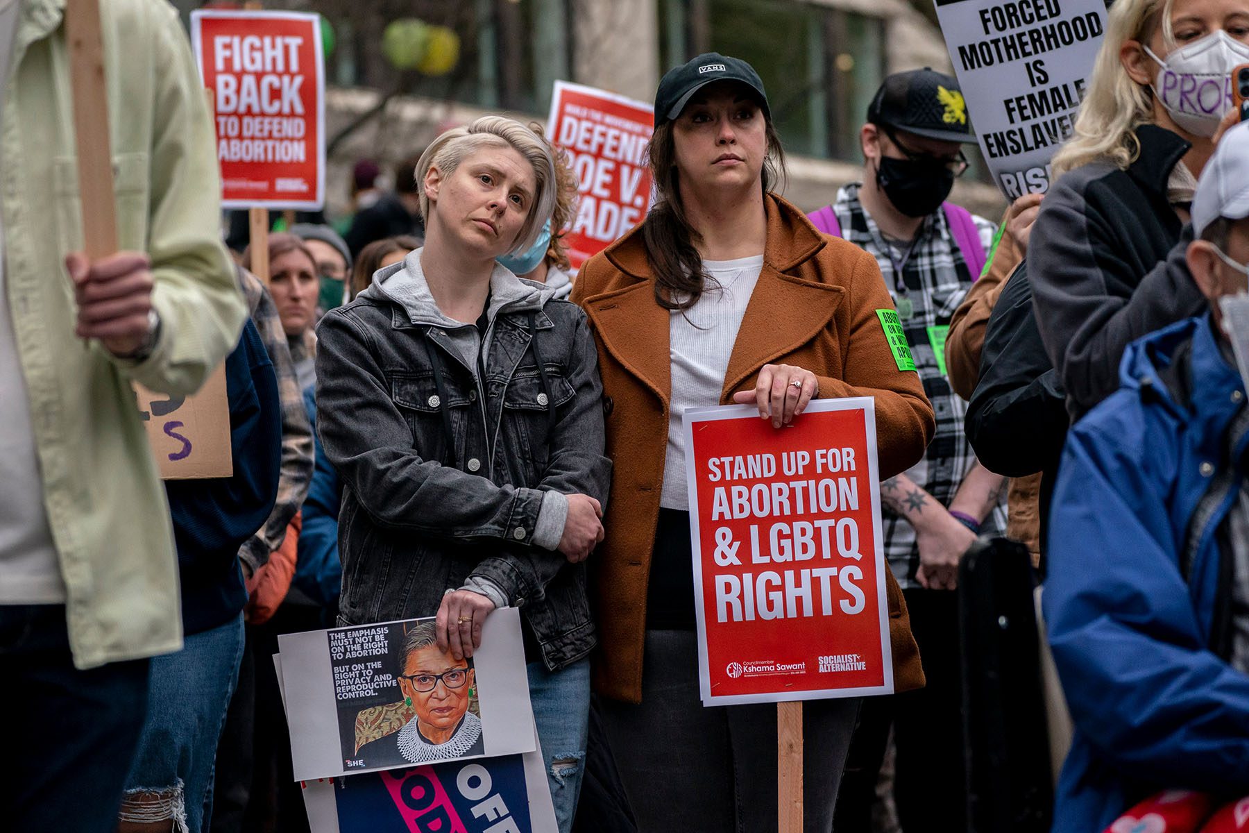 Demonstrators react during a rally while holding a sign that reads "Stand up for Abortion & LGBTQ rights" in May 2022 in Seattle, Washington.