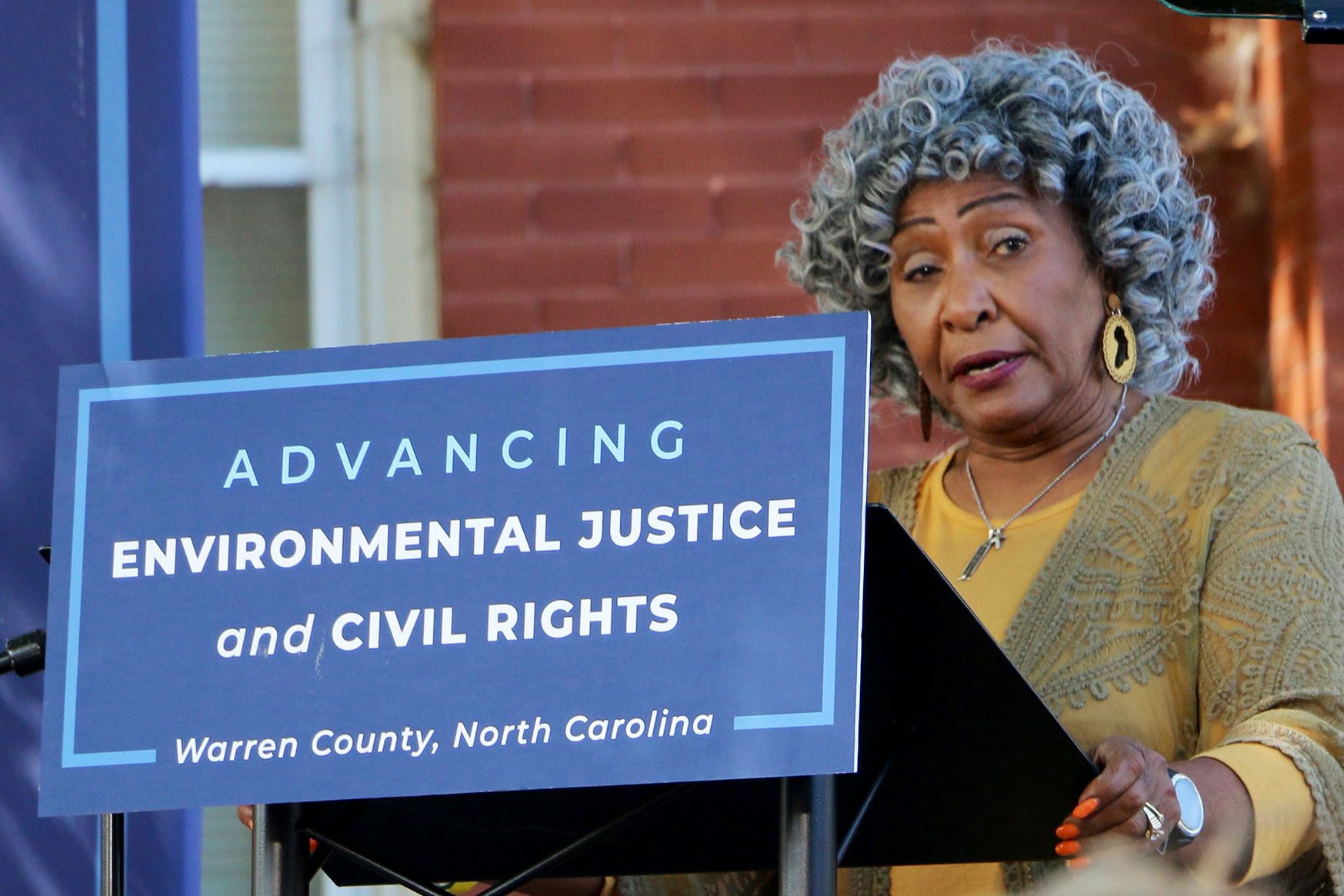 Dollie Burwell speaks at a ceremony.