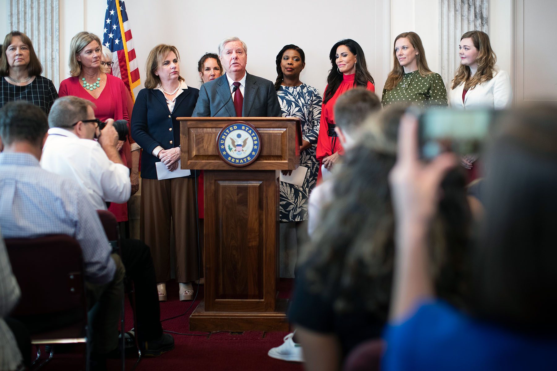 Senator Lindsey Graham speaks beside anti-abortion leaders.