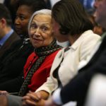 Lois Dickson Rice, center, in red, with her daughter, National Security Adviser Susan Rice