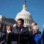 Rep. Mike Johnson speaks at a press conference in front of the U.S. Capitol.