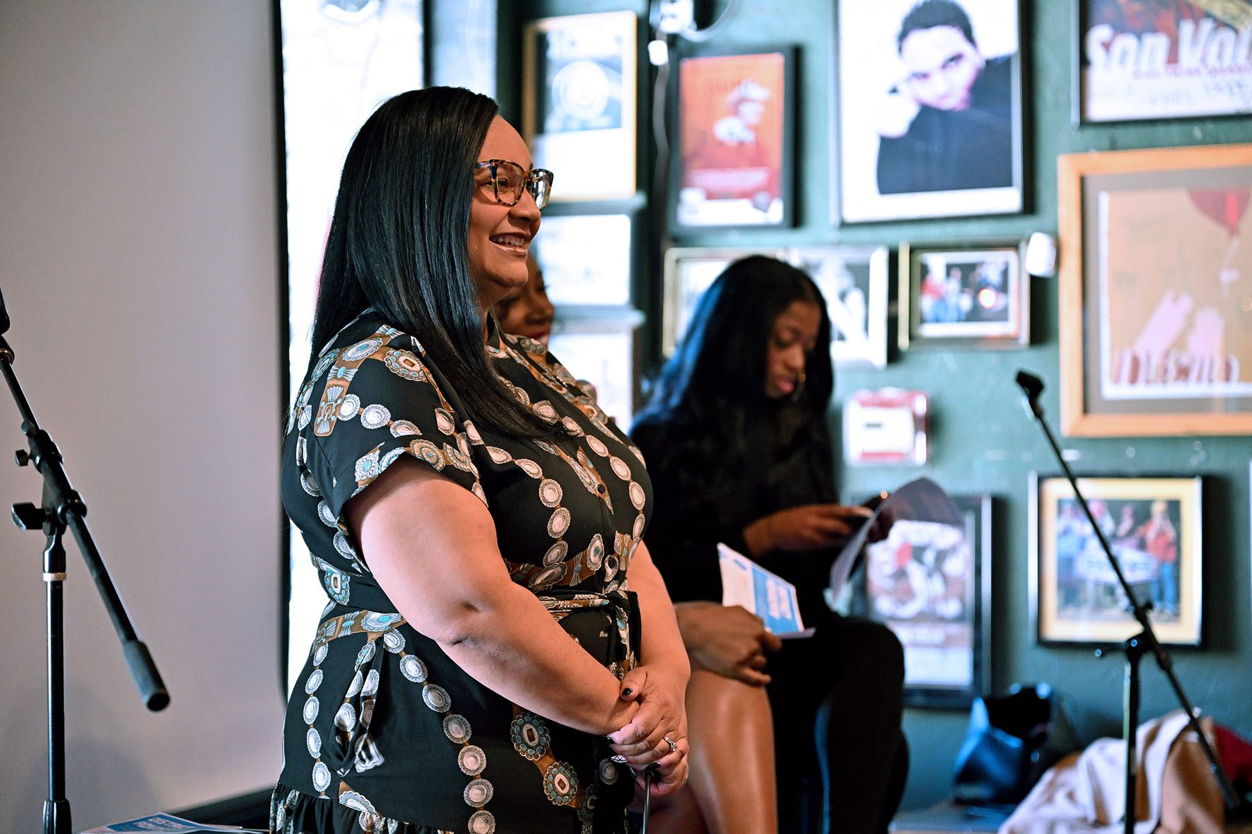 Nikema Williams speaks at an Atlanta event held at a music venue.