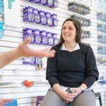 Amanda Cappelletti speaks with constituents in a local shop.