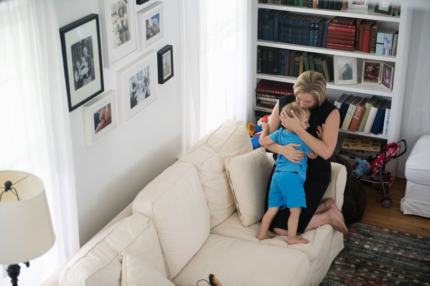 Liuba Grechen Shirley takes a break from shooting her campaign ad to share a hug with her son, Nicholas.
