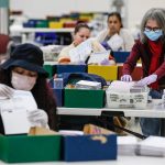 Ballots are received, sorted and verified at the Los Angeles County ballot processing facility.