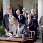 President Clinton signs the Family Leave Bill in the Rose Garden of the White House.