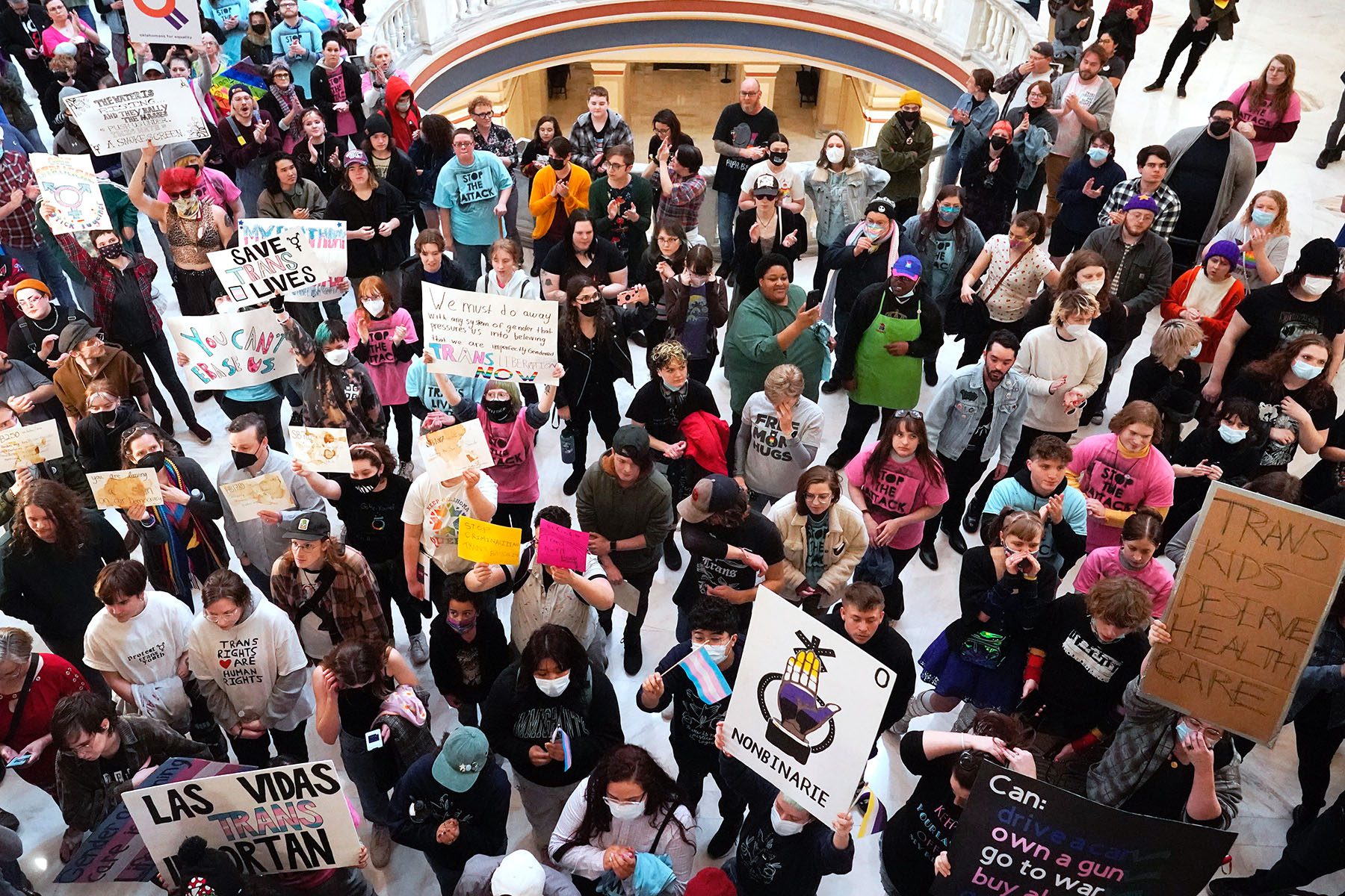 Trans-rights activists protest outside the House chamber at the Oklahoma State Capitol.