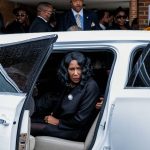 RowVaughn Wells looks on as she gets into a car after the funeral service for her son, Tyre Nichols, at Mississippi Boulevard Christian Church.