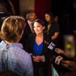 Nikki Fried speaks to the media during an election night event for her gubernatorial campaign.