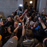 Reporters surround Reps. Gloria Johnson and Justin Jones in the Tennessee Capitol