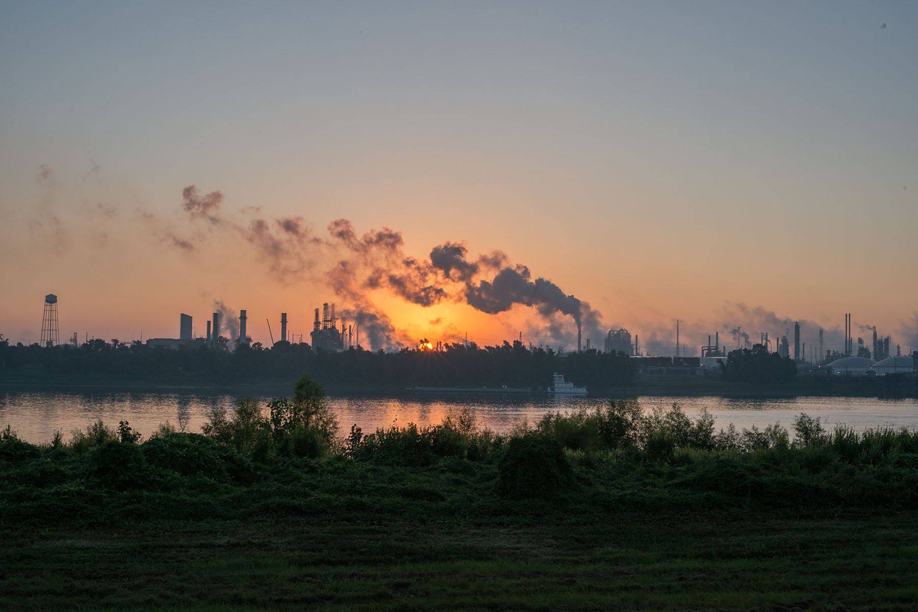 Smoke billows from one of many chemical plants near Baton Rouge, Louisiana in "Cancer Alley," one of the most polluted areas in the United States.