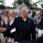 Former Vice President Mike Pence tours the Iowa State Fair in Des Moines, Iowa.