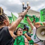 Abortion rights demonstrators chant in response to the Dobbs v Jackson Women's Health Organization ruling in front of the Supreme Court.