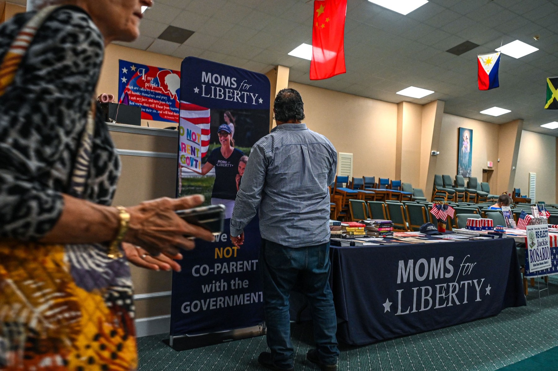 A "Moms For Liberty" stand is seen in Vero Beach, Florida in October 2022.