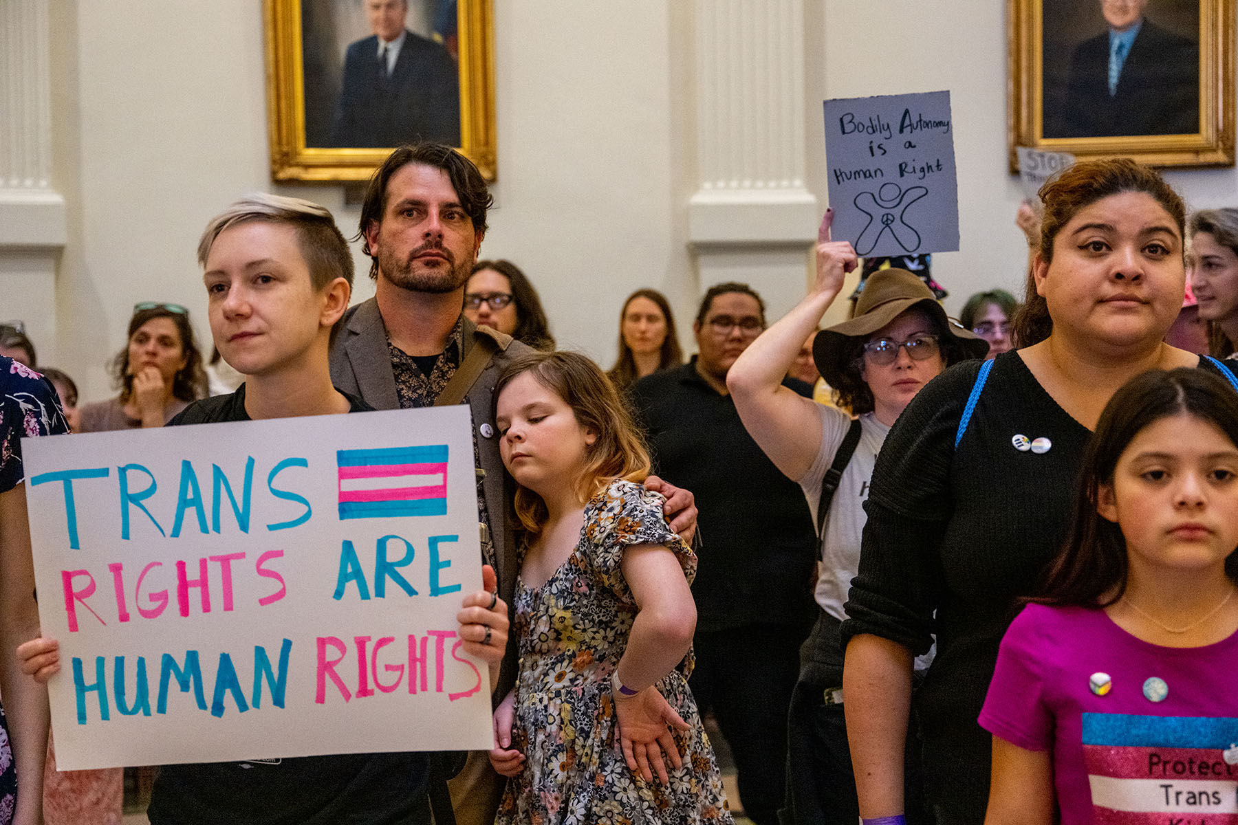 Abortion rights demonstrators and transgender rights activists gather during an abortion rights demonstration at the Texas State Capitol.