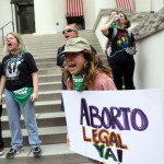 Protesters and activists convene at the Florida State Capitol after the Florida State Senate voted to pass a 6-week abortion ban.