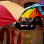 Abortion rights activists block members of a religious group as they pray in front of a Planned Parenthood clinic.