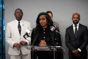 Arian Simone speaks at a news conference, with attorneys Ben Crump and Alphonso David.