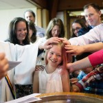 Rebekah smiles as her congregation blesses her during a 