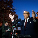 Rudy Giuliani speaks to the press as he leaves the E. Barrett Prettyman U.S. District Courthouse.