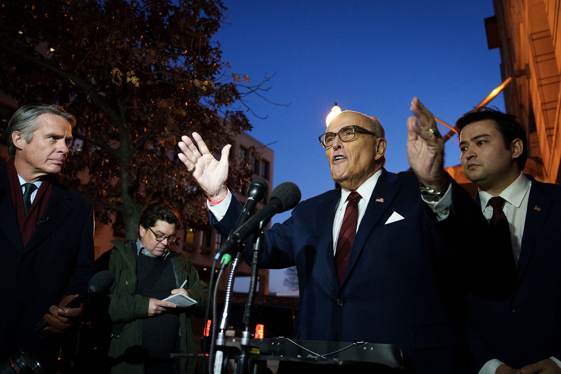 Rudy Giuliani speaks to the press as he leaves the E. Barrett Prettyman U.S. District Courthouse.