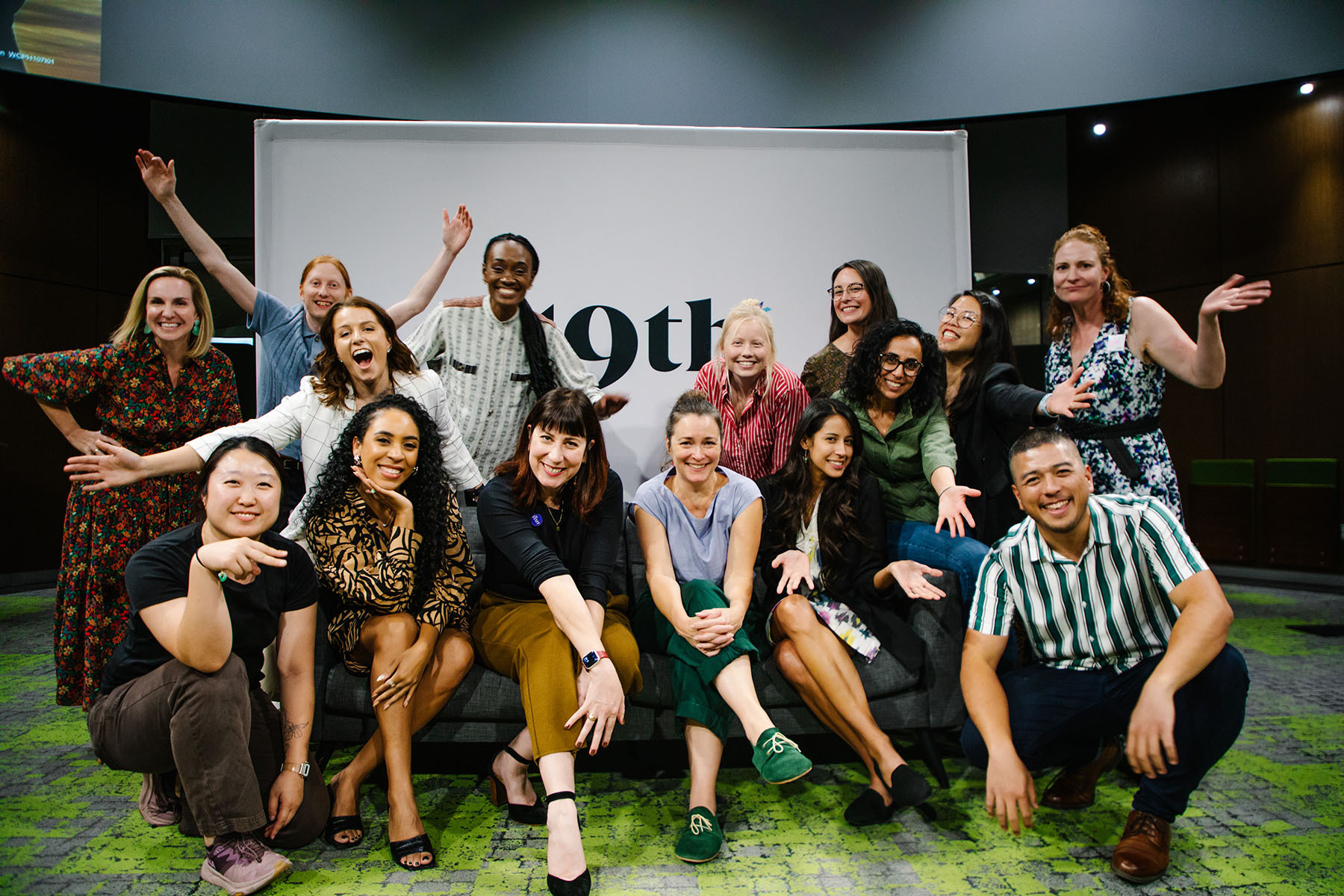 19th staff members pose together after wrapping up an event in Phoenix, Arizona.