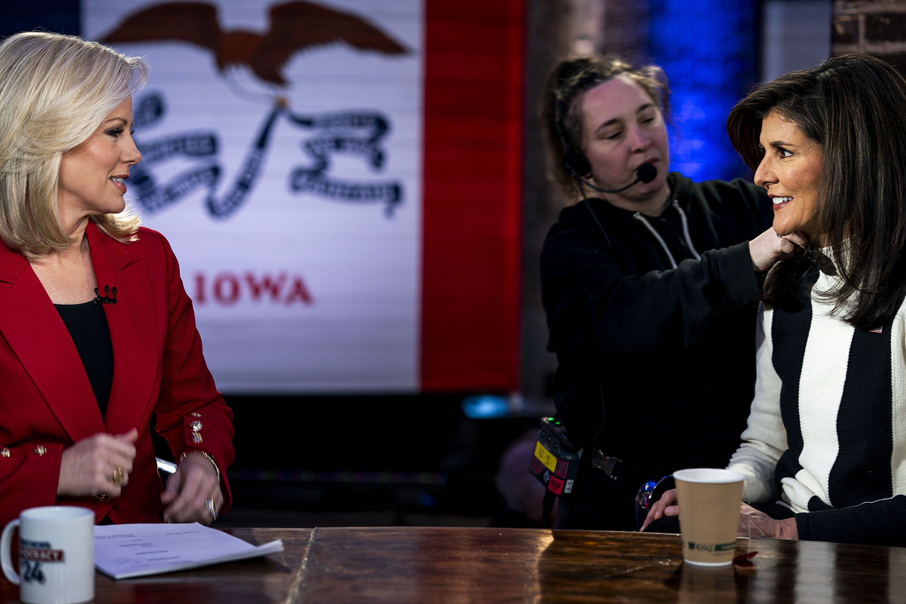 Nikki Haley has her microphone attached before an interview at Fox Iowa Caucus studios.