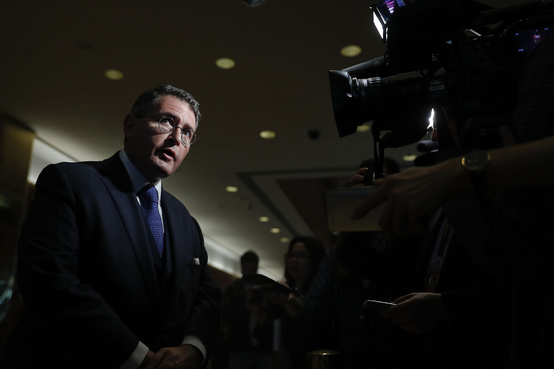 Leonard Leo is seen speaking to cameras at Trump Tower.