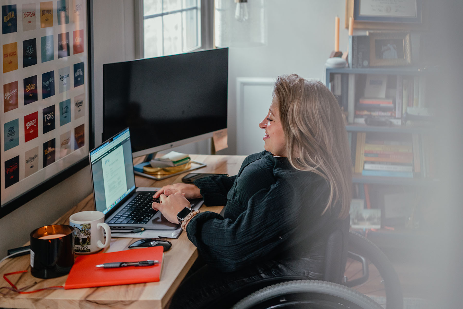 Emily Voorde works at her desk at her home office.