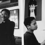 Diptych of Synthia Saint James posing and painting in her studio.