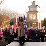 Nikki Haley speaks on stage during a campaign event.