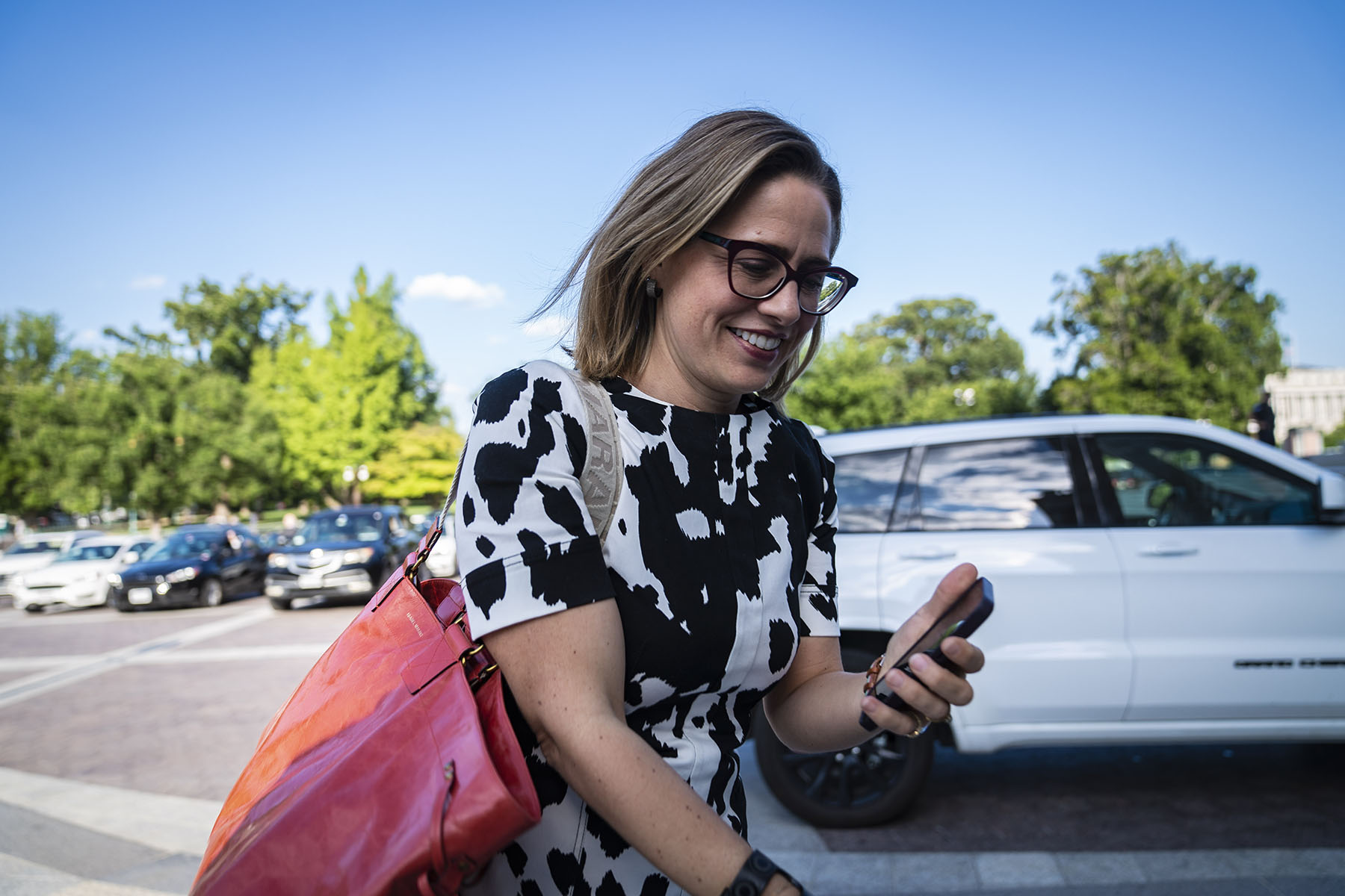 Sen. Kyrsten Sinema walks to the Senate floor for a vote on Capitol Hill.