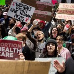 Abortion rights activists chant as they march during an abortion-rights rally.