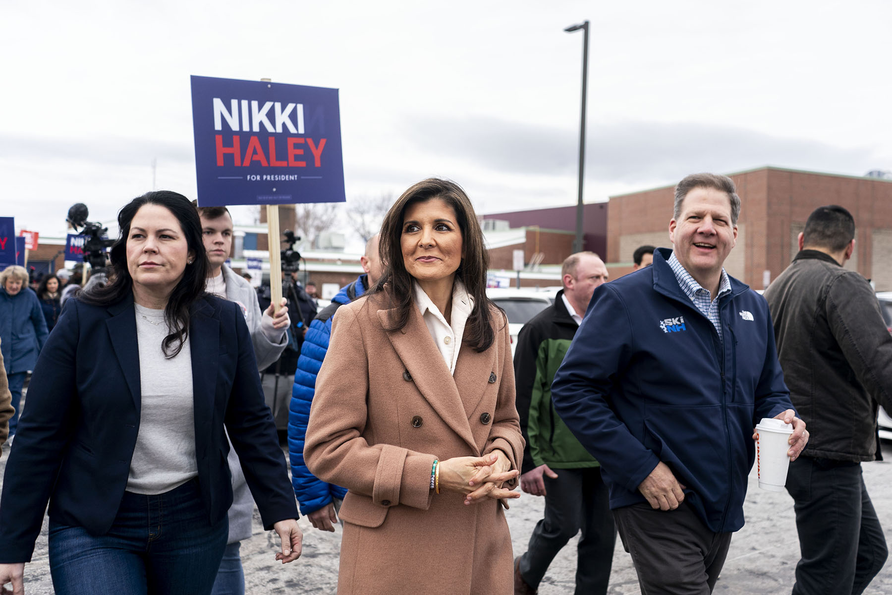 Nikki Haley and New Hampshire Governor Chris Sununu greet voters as they make their way to the polls.