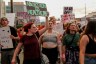 Abortion rights activist protest during a rally near the Tucson Federal Courthouse in Tucson, Arizona.